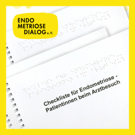 Mappe mit Brailleschrift und Aufschirft Endometriiose Dialog e. V. 